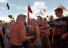 A-man-talking-to-girl-during-concert-of-25th-PolandRock-festival-Kostrzyn-20190801